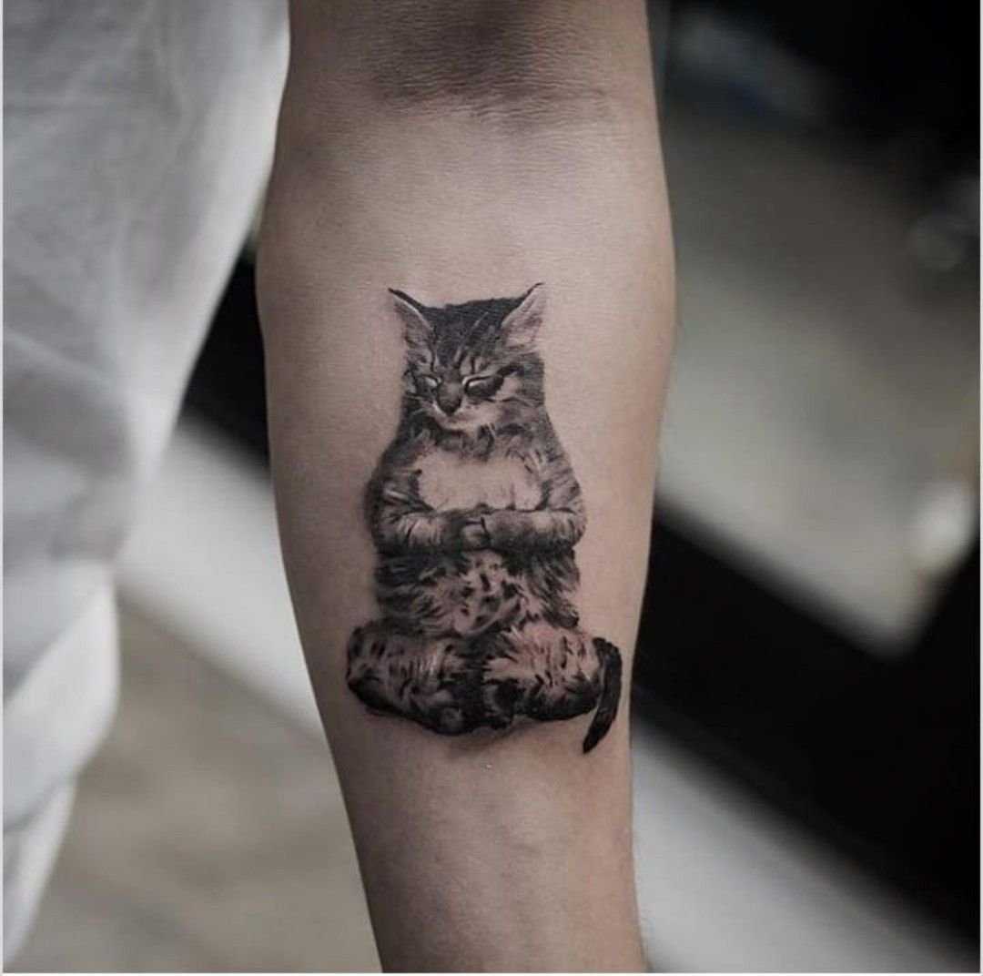 Значение татуировки кошка для девушек